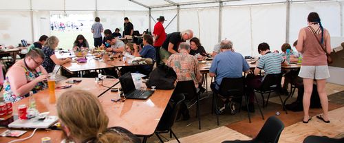 Room full of happy hardware hackers at the Hardware Hacking Area at EMF Camp 2016